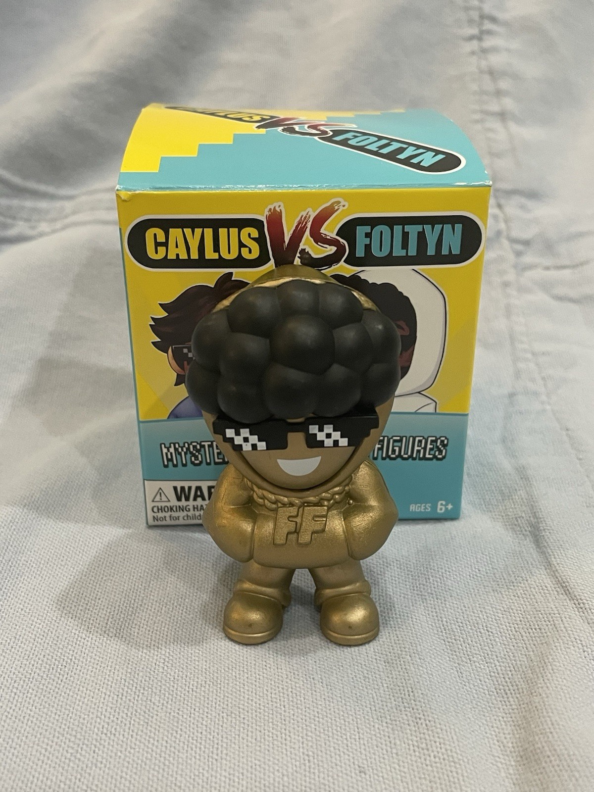 NUOVA minifigure Open Box Caylus vs Foltyn Mystery Aura 3" - Golden Aura Foltyn