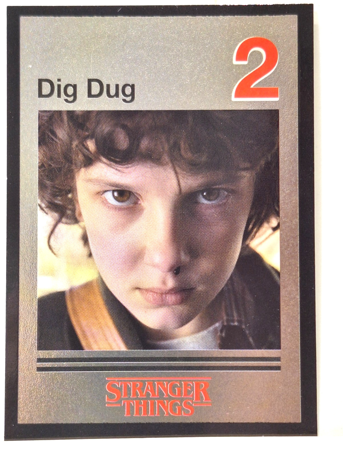 2026 Panini Stranger Things Questa è la nostra storia Foil Card #38 Eleven