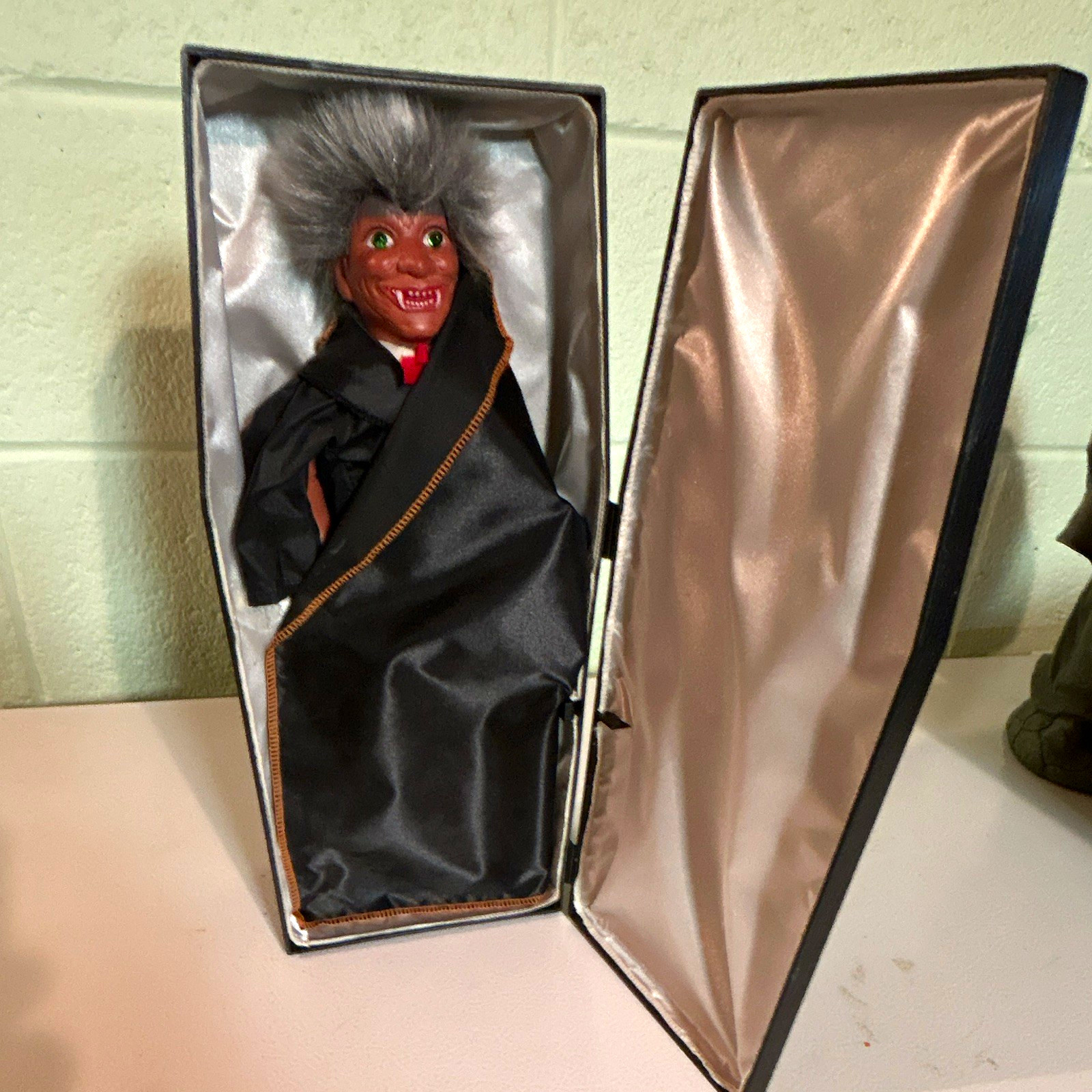 Vampire in a coffin. Battery operated with sound.