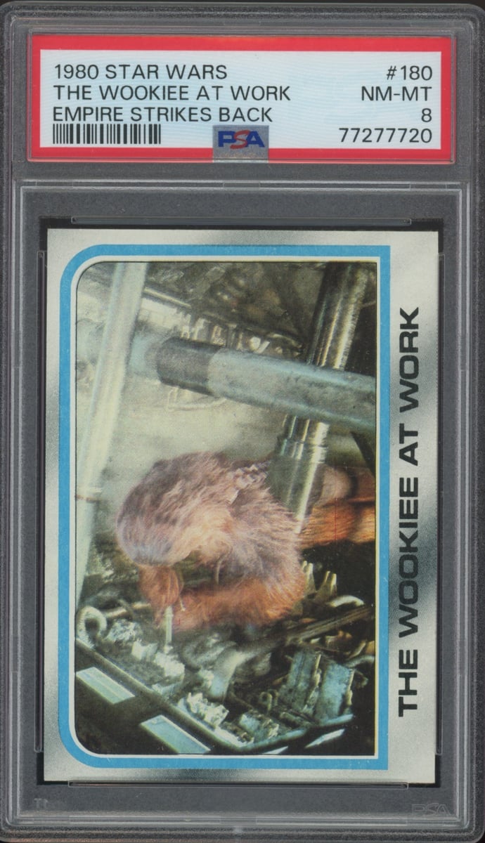 1980 Topps - Star Wars: L'impero colpisce ancora - Il Wookiee al lavoro #180 PSA 8