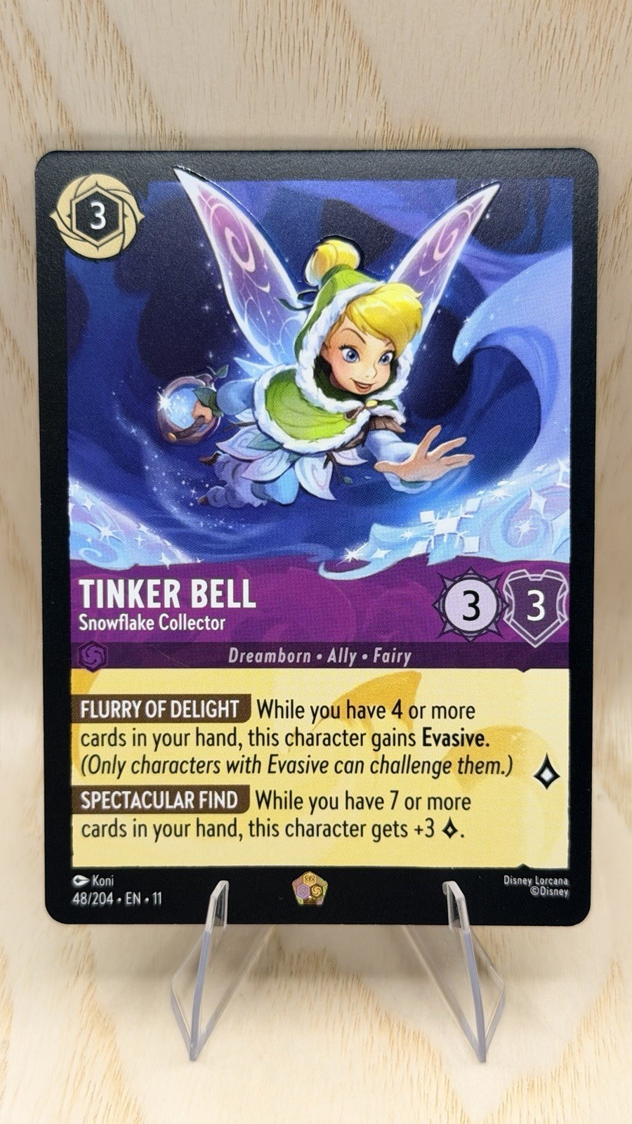 Lorcana Tinker Bell - Collettore Fiocchi di Neve 48/204 Winterspell Regular