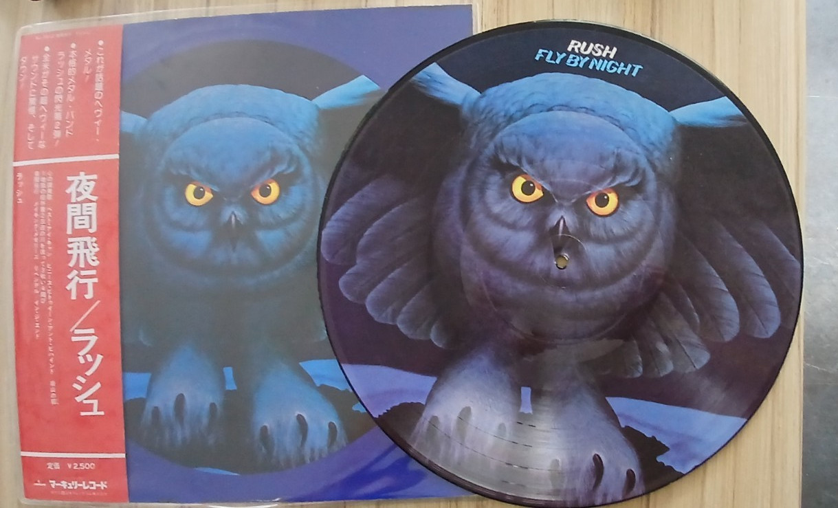 RUSH-FLY BY NIGHT EUROPEAN ISSUE PIC DISC TO LOOK JAPANESE. WITH BACK PRINT CARD