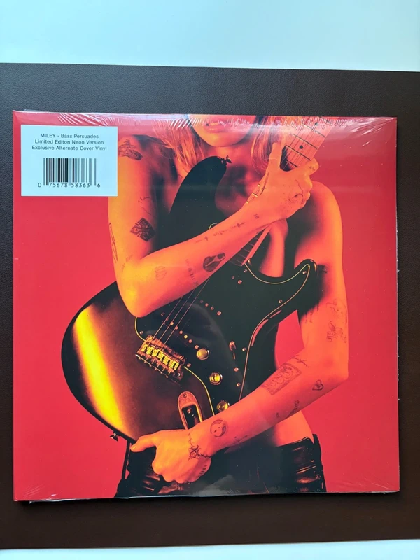 Miley Cyrus - Bass Persuades Store Exclusive "Neon Coral" Vinyl