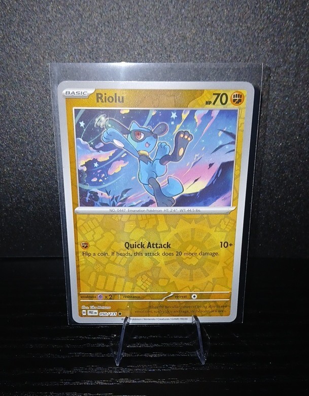 Riolu (Poke Ball Pattern) 050/131 Sv: Prismatic Evolutions Holo