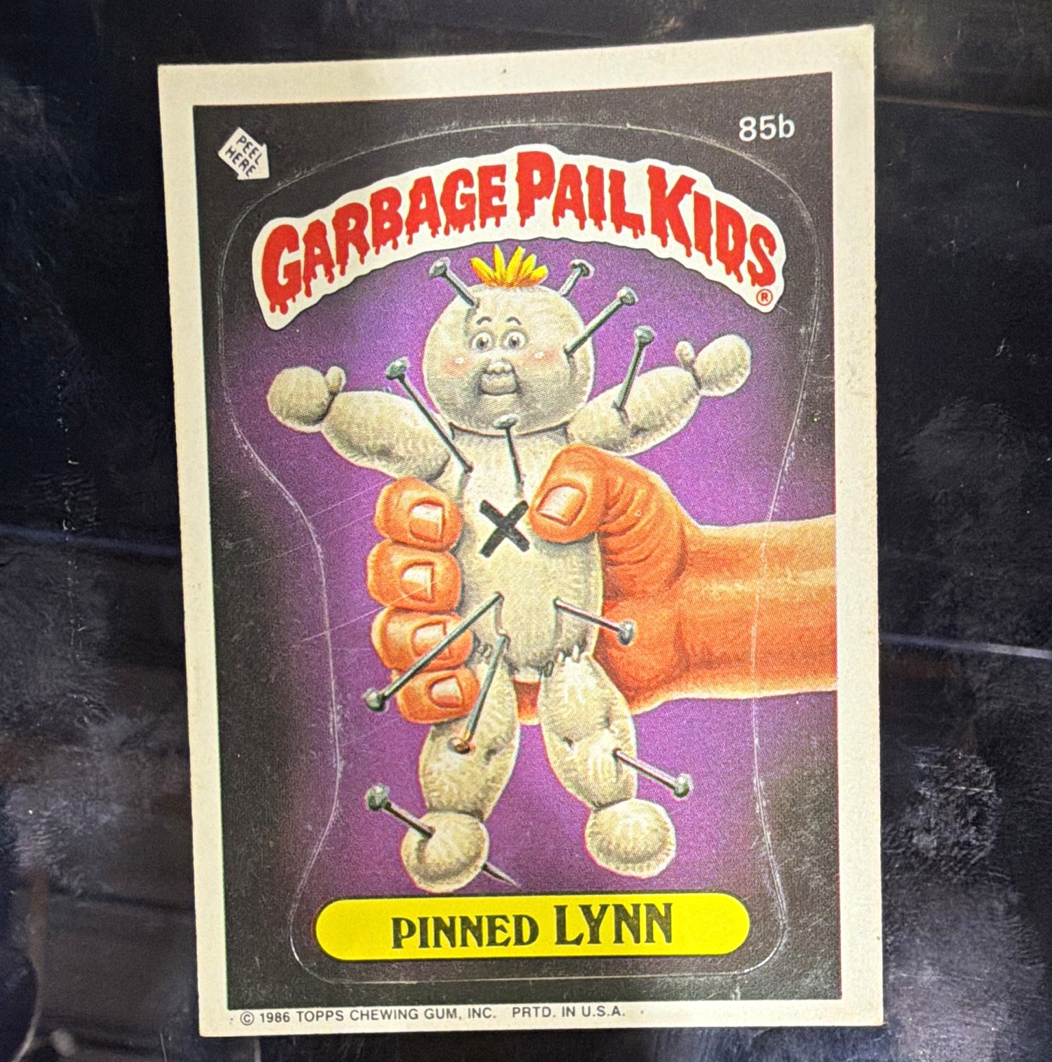 Topps Garbage Pail Kids 1986 Sticker Trading Card #85b "Pinned Lynn"