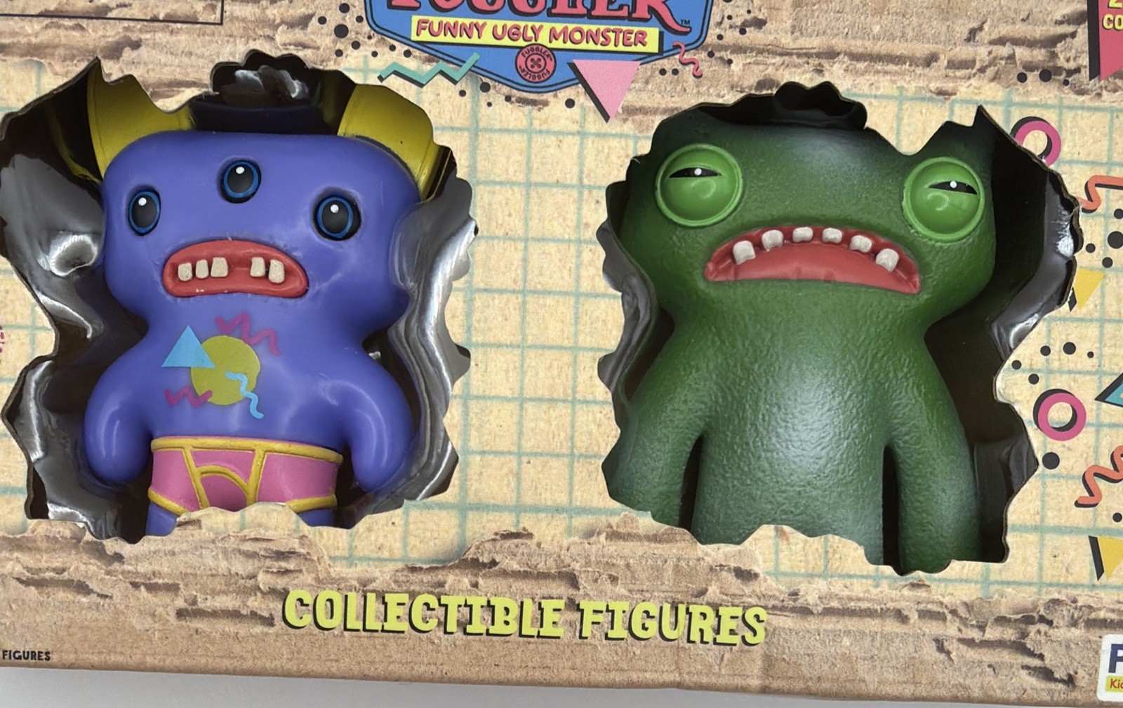 Figurine Fuggler da collezione 2,25” 2pz Rad Edition Grin Grin & Annoyed Alien NUOVE