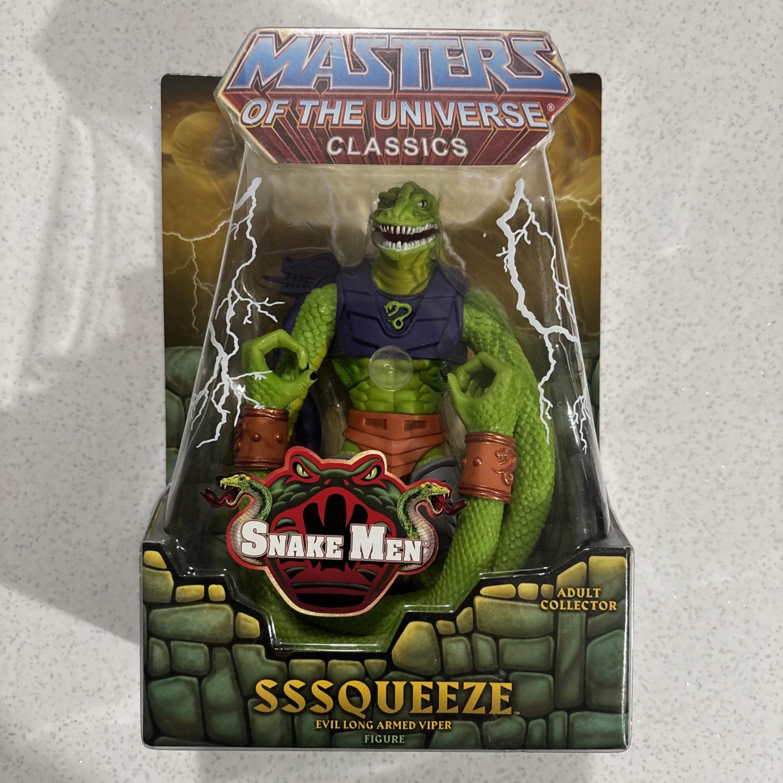 2014 Masters of the Universe Classics MOTUC Sssqueeze Squeeze Figura Sigillata