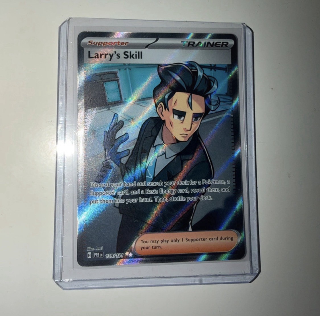 Larry's Skill 139/131 Ultra Rara Evoluzioni Prismatiche Pokemon Holo