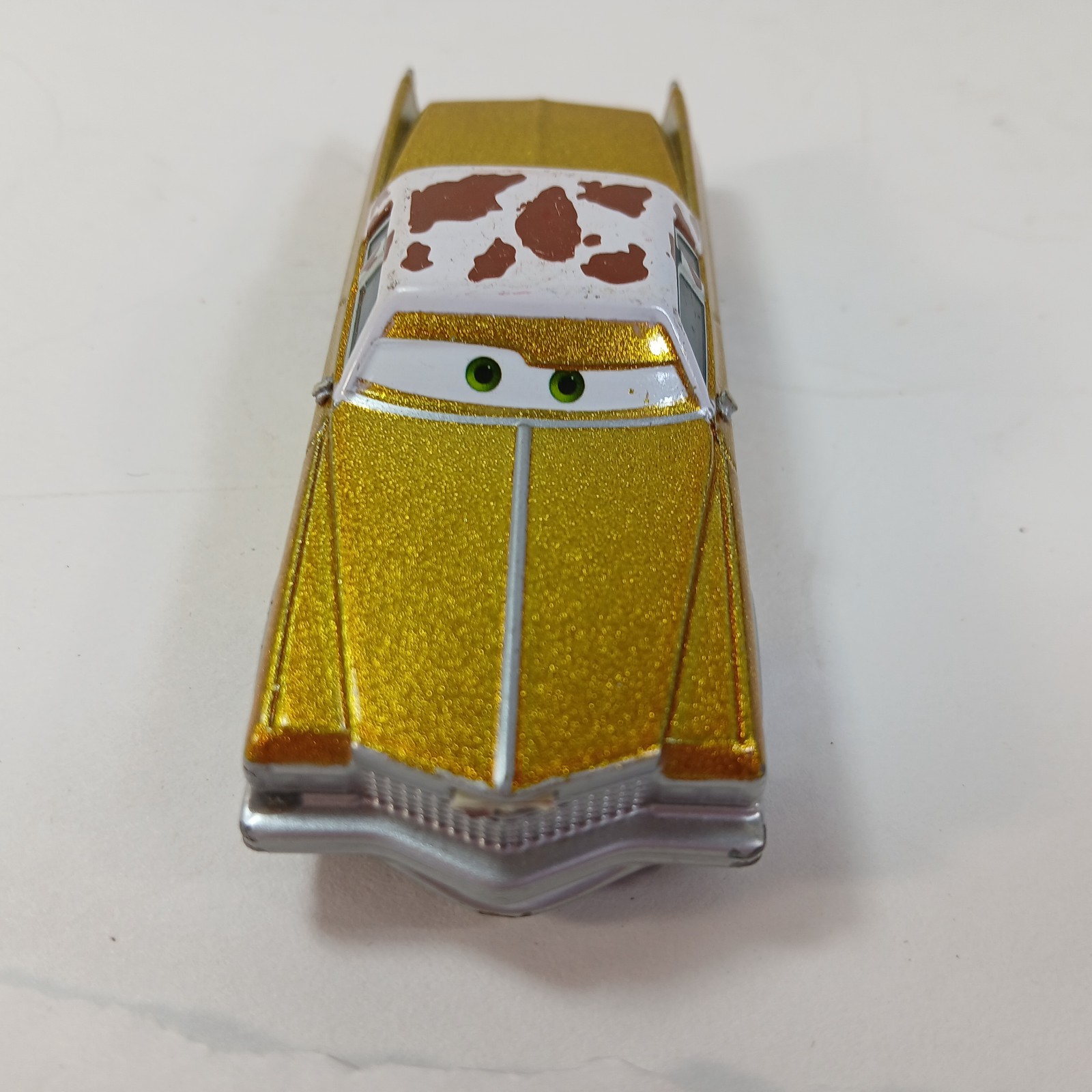 Disney Pixar Movie Cars Tex Dinoco Gold Cow Prints 1:55 Toy Figure