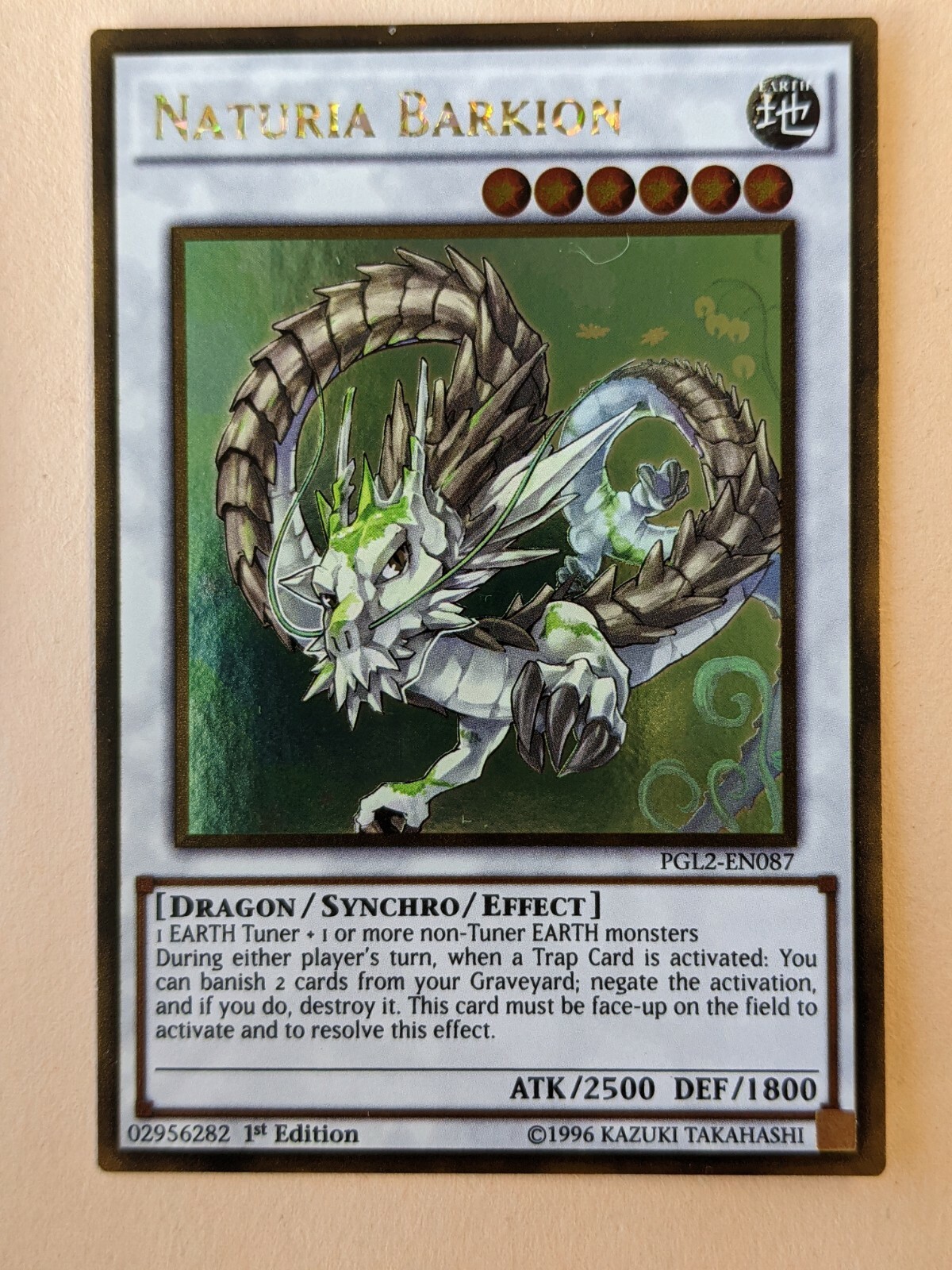 YUGIOH-NATURIA BARKION-1ST EDITION GOLD RARE-PGL2-EN087