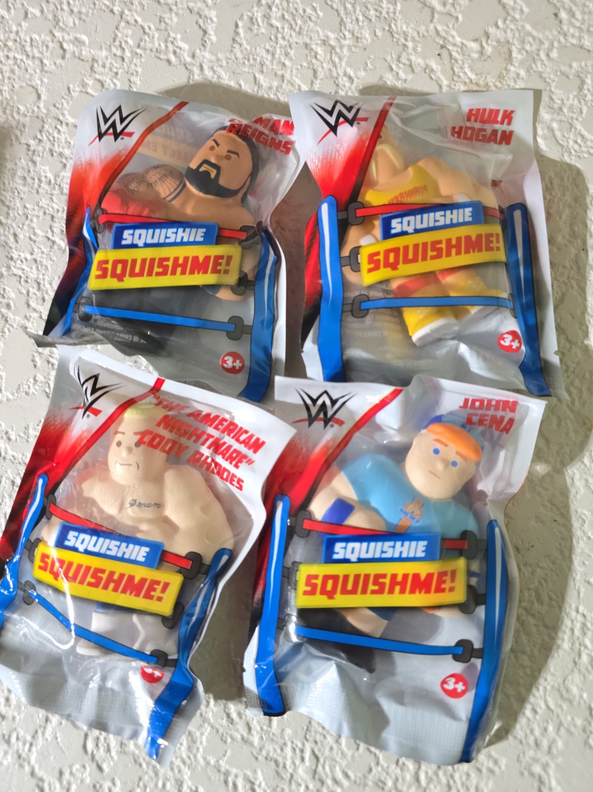  SET Of 4 WWE SQUISHME  SQUISHIES HULK HOGAN ROMAN REIGNS CODY RHODES CENA NEW