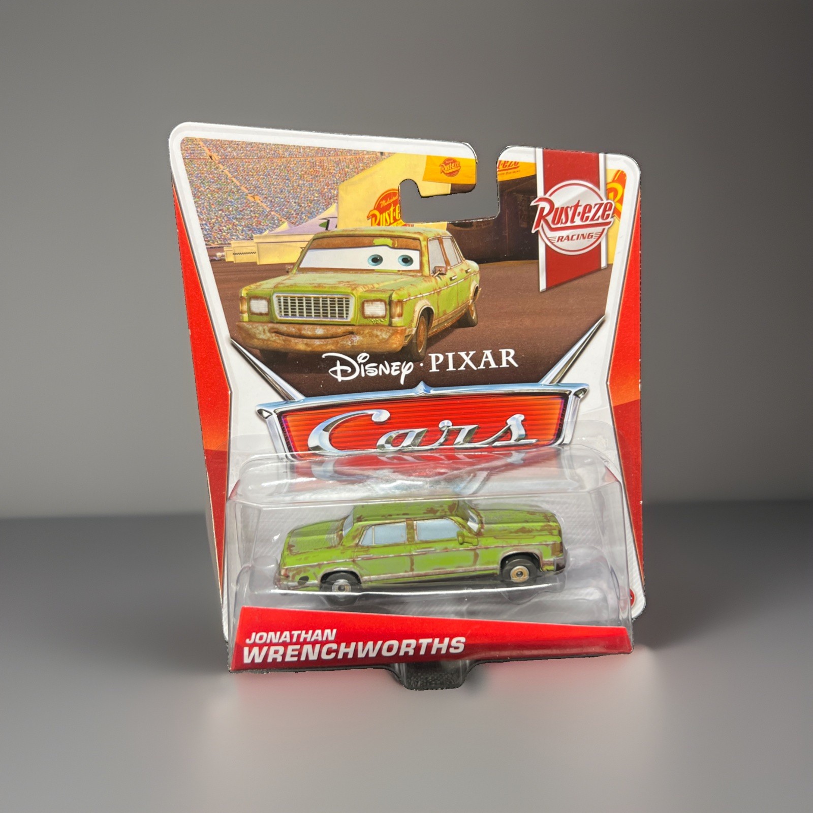 AUTO Disney Pixar JOHNATHAN WRENCHWORTHS - Nuove Sigillate Rust-eze Racing CARS 2