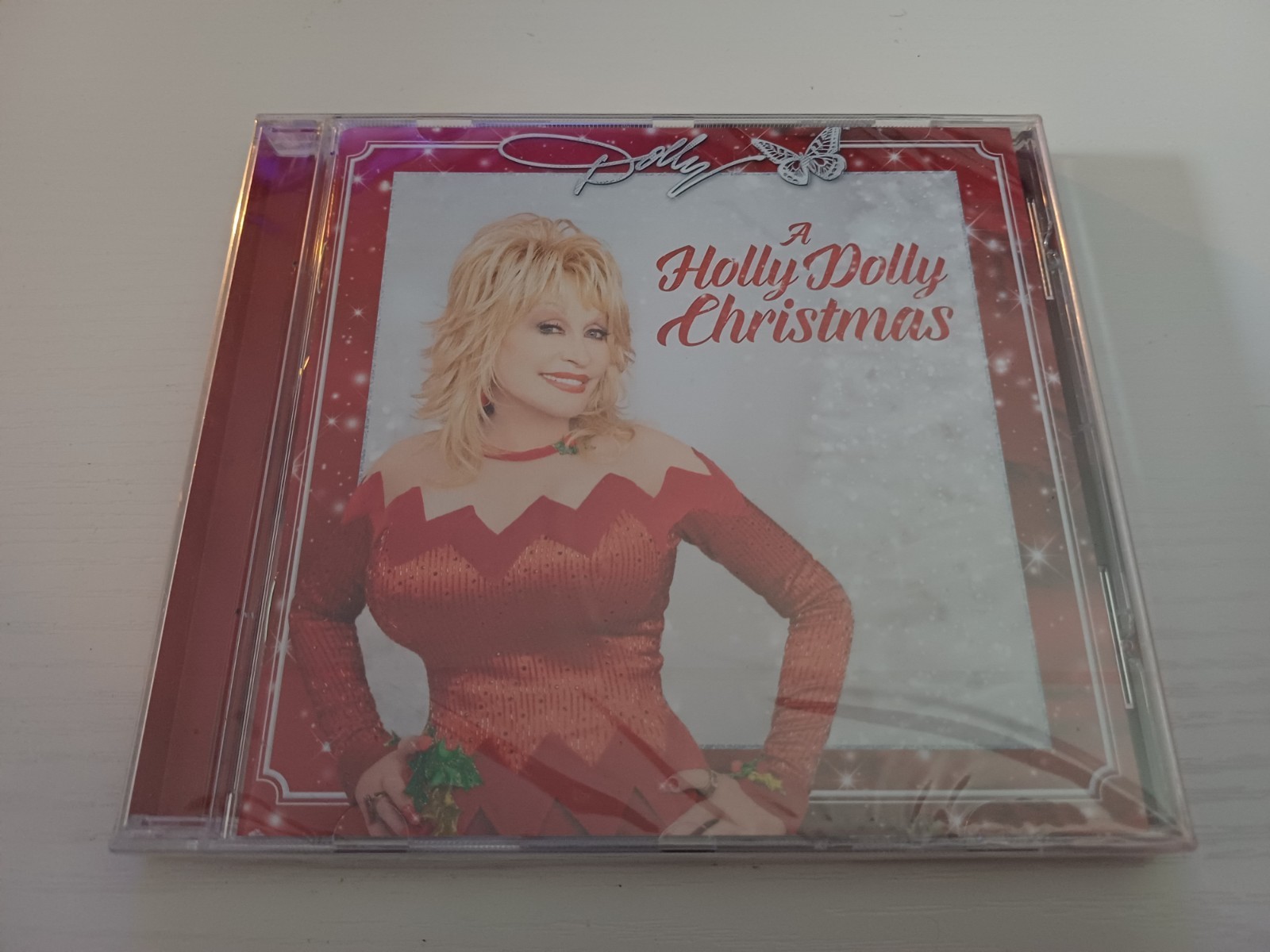 DOLLY PARTON A HOLLY DOLLY CHRISTMAS CD  new & sealed album free p&p 