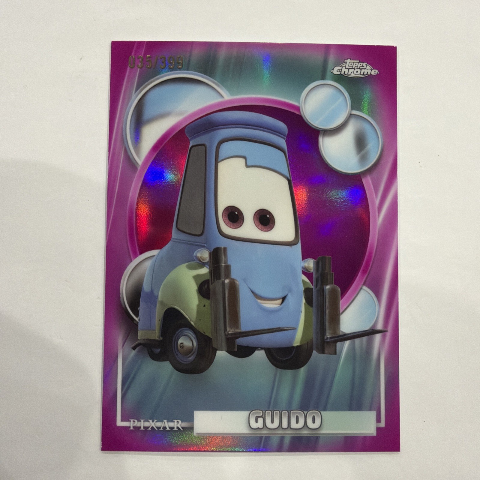 2026 Topps Chrome Disney - Cars - #23 Guido Magenta Rifrattore #/399
