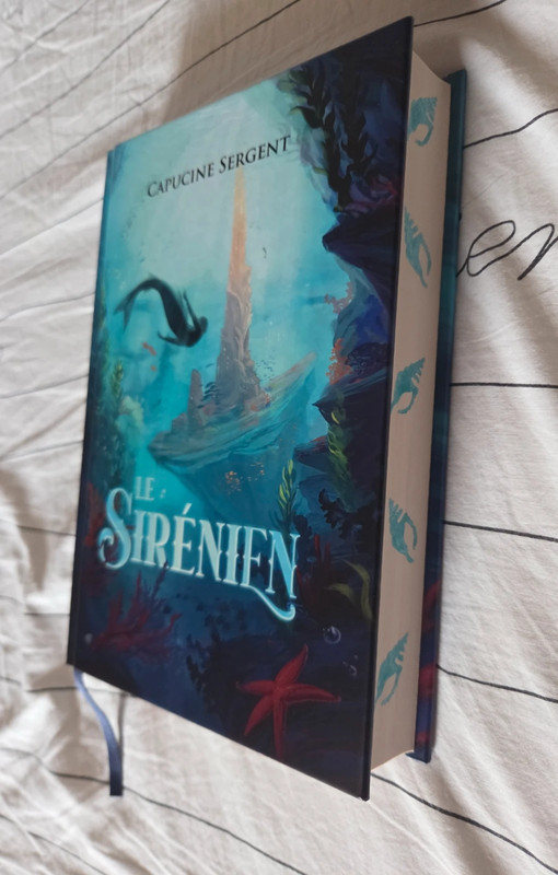 Le Sirénien de Capucine Sergent - livre relié avec jaspage fait par l'autrice
