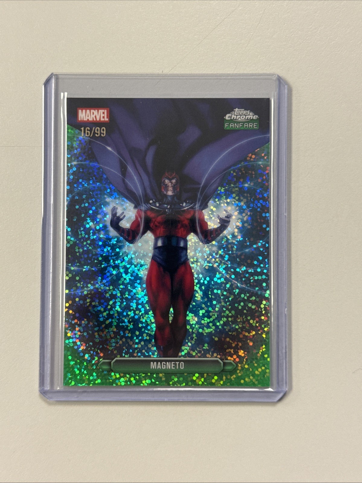 2026 Topps Chrome Marvel Magneto Fanfara verde macchia /99