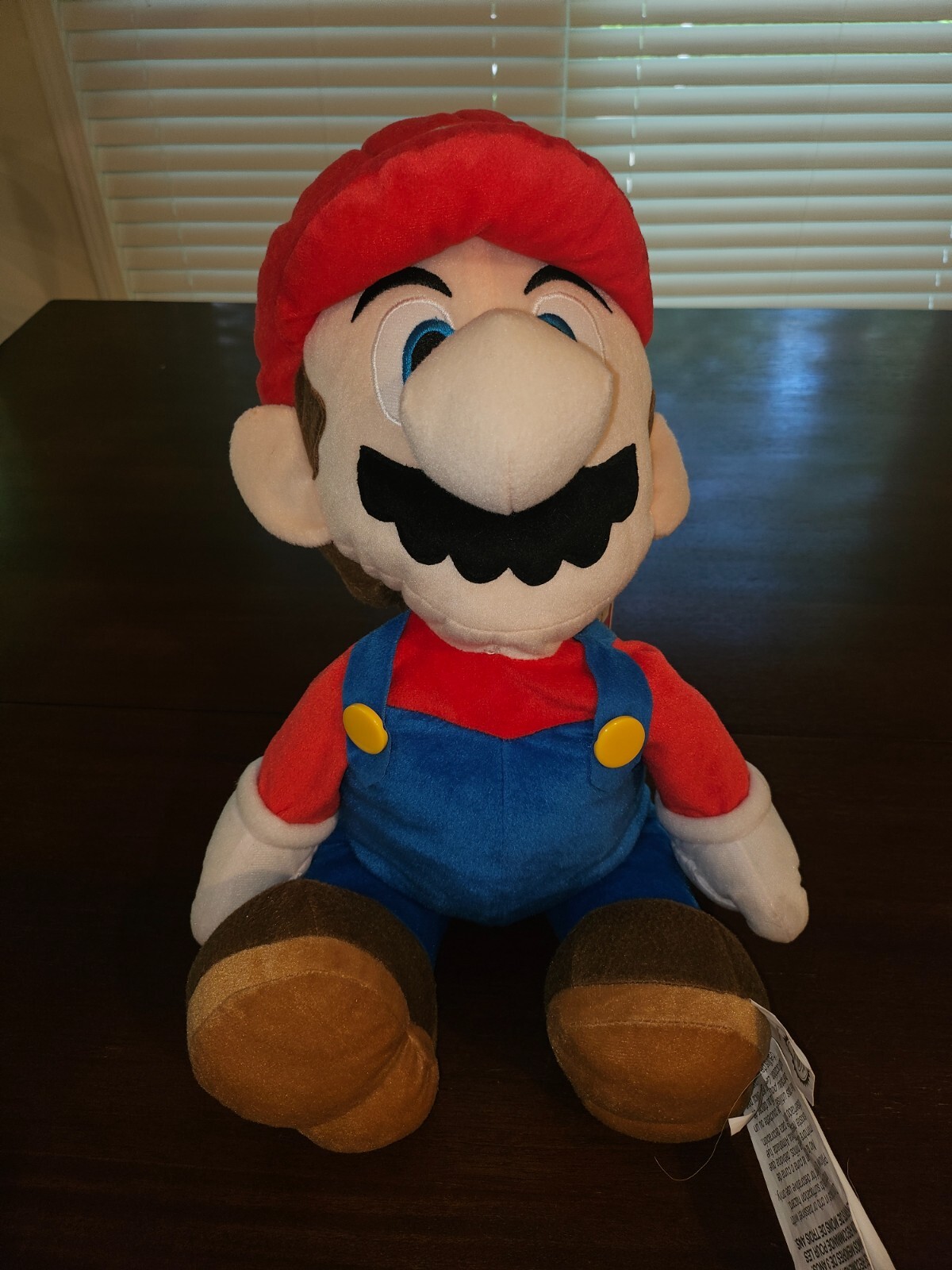 Nintendo Super Mario Bros Mario Peluche 22" Jumbo con Custodia Segreta Ufficiale