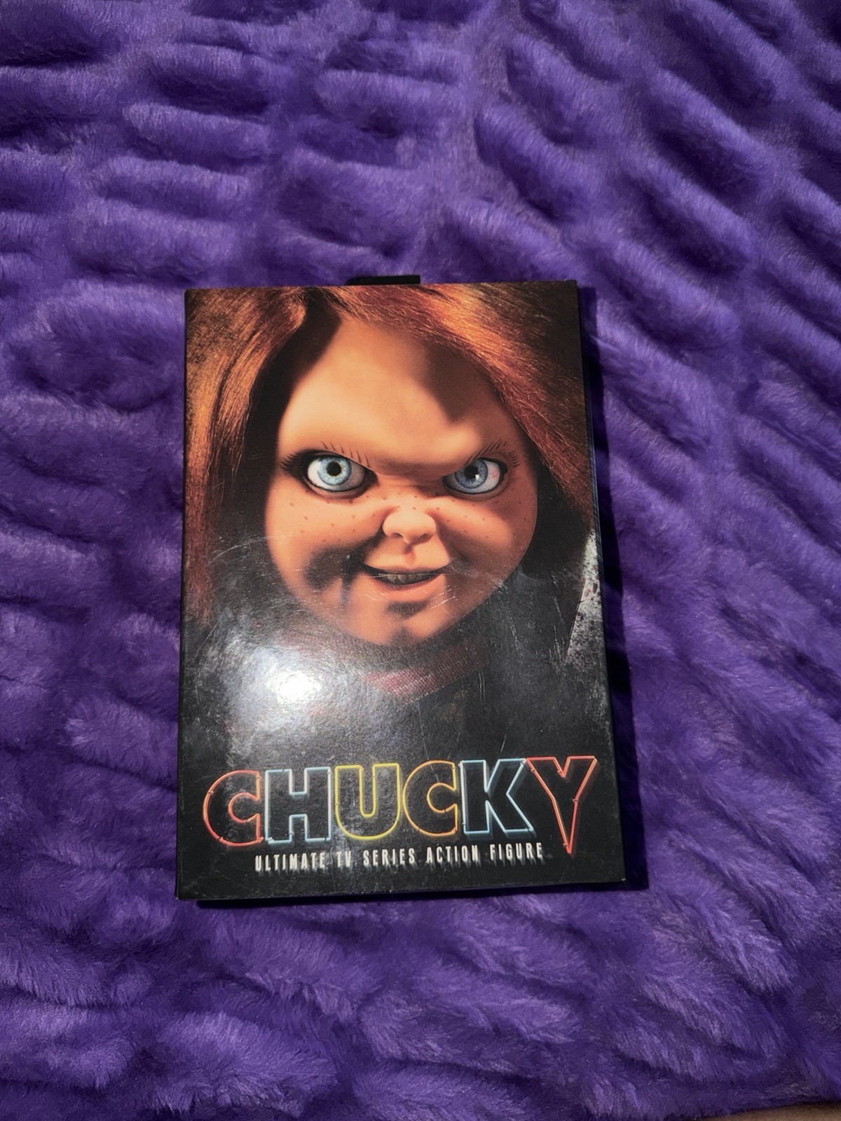 Modellino NECA Chucky Ultimate serie TV da 4 pollici con teste e mani