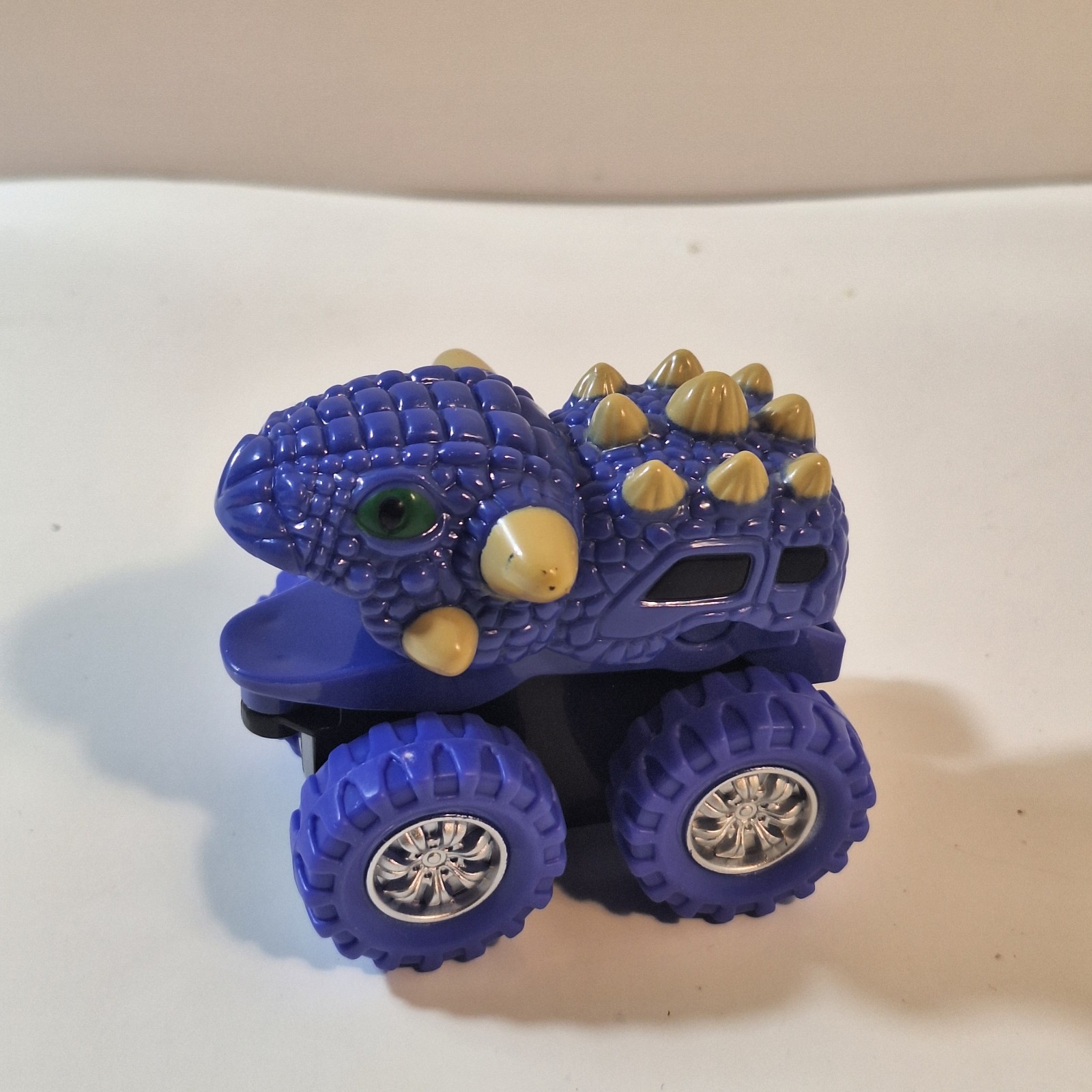 Spark Create Imagine Viola Dino Monster Truck Giocattolo 2,5"