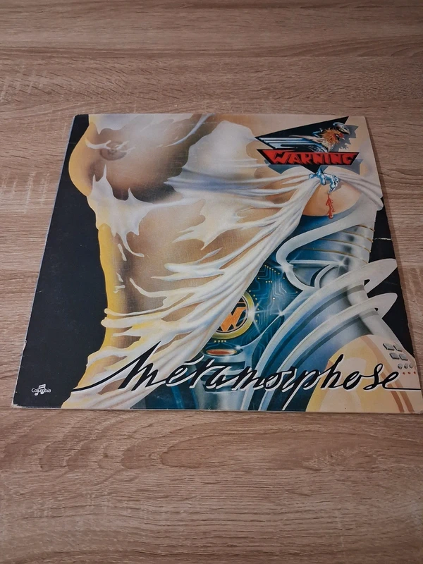 Vinyle warning metamorphose