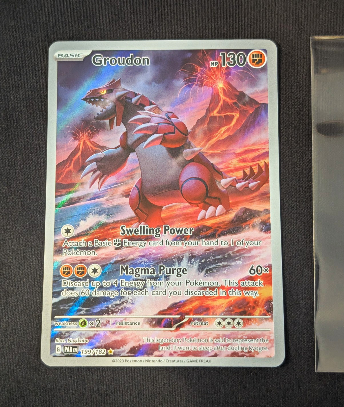 Groudon 199/182 Paradox Rift illustrazione rara inglese quasi nuova (viene fornita con custodia)