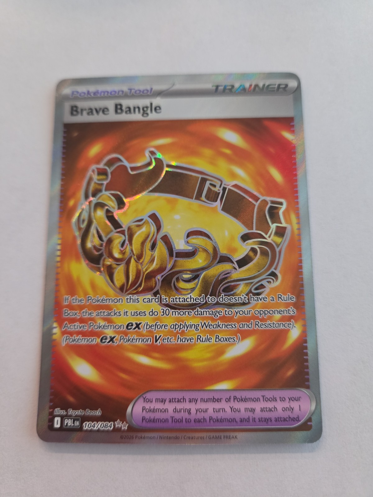 Brave Bangle 104/084 Me05 Pitch Black Holo Pokemon Strumento TCG NM