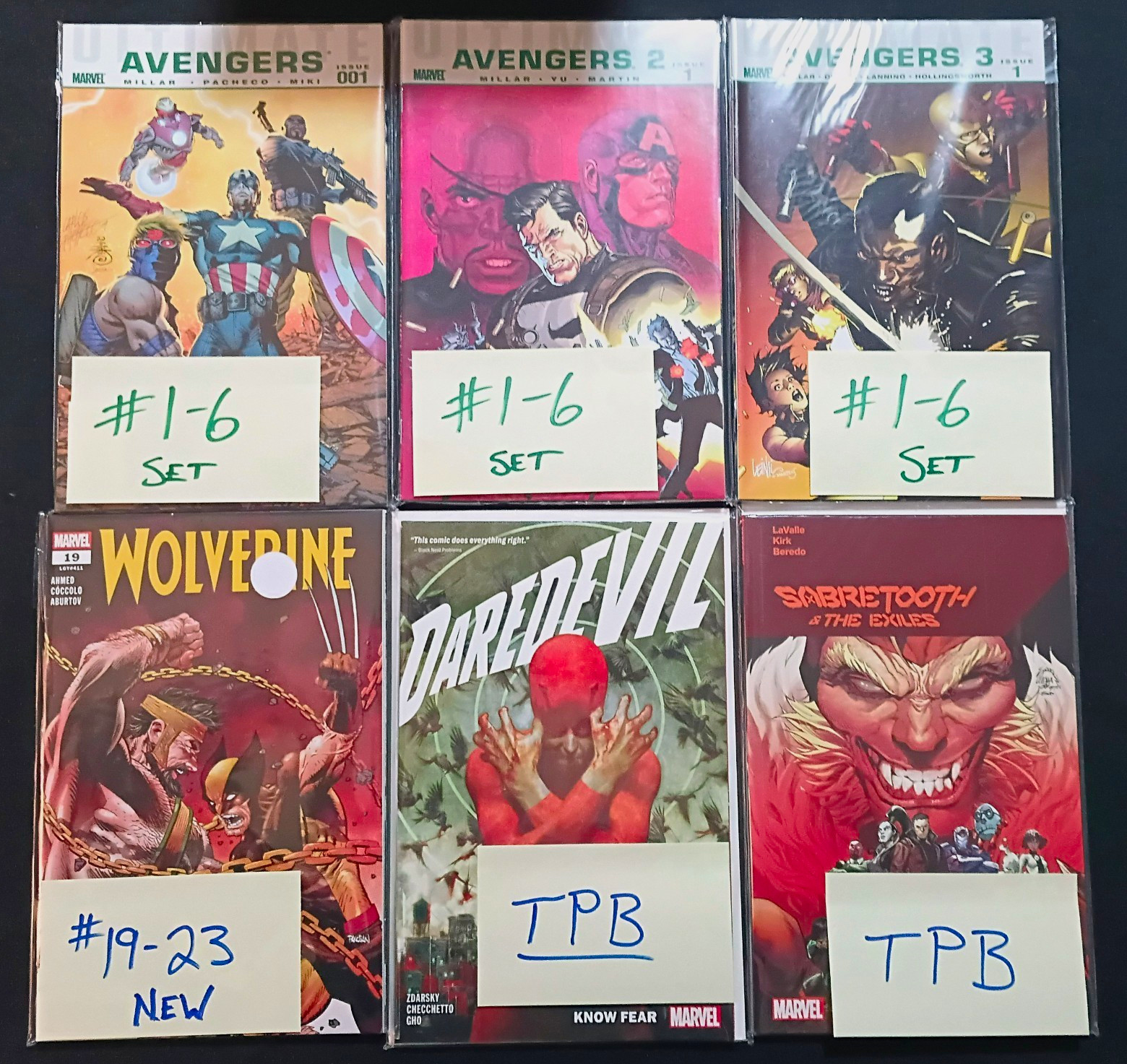 Marvel Comics Lot: Ultimate Avengers Sets, Wolverine, Daredevil TPB, &More.
