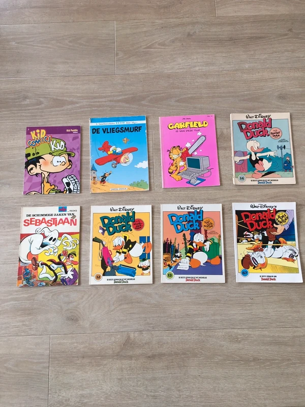 8 grappige strips van oa Donald Duck Garfield