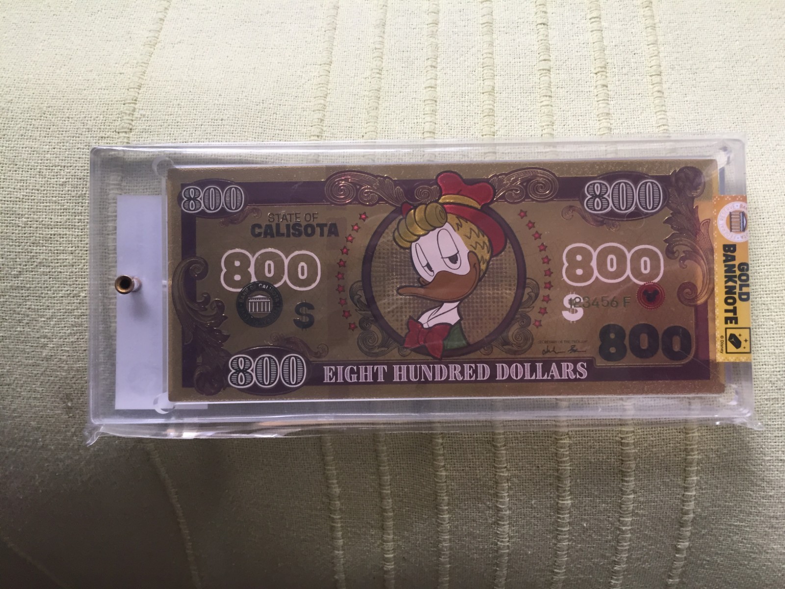 DISNEY GOLD BANKNOTE GASTONE 800$. NUOVA / SIGILLATA ORIGINALE. PERFETTA!