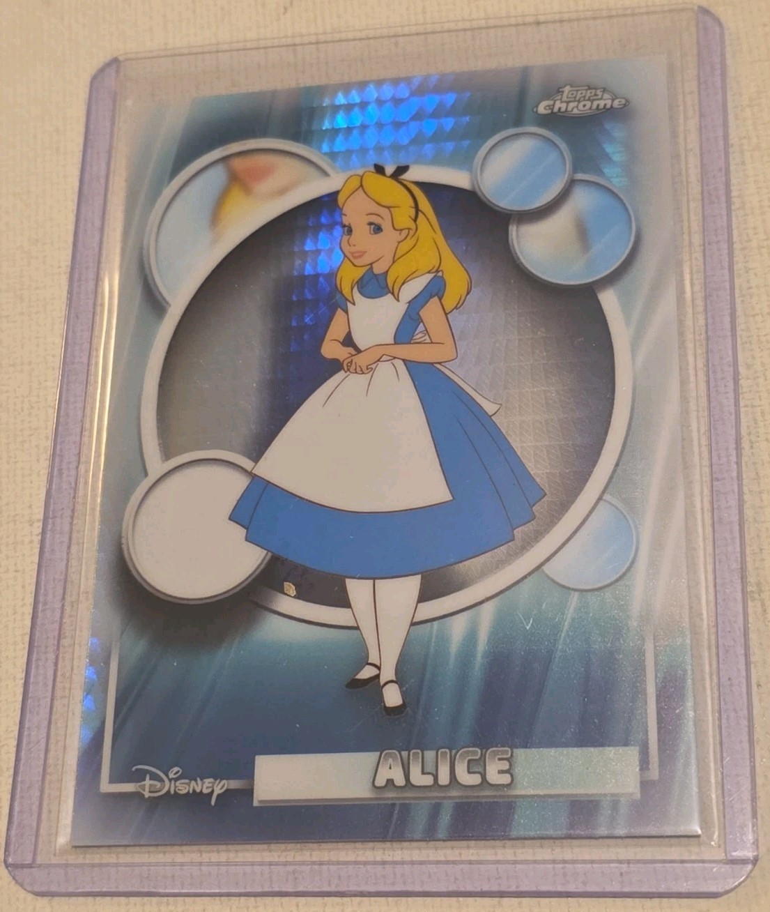 2026 Topps Chrome Disney Alice rifrattore a scacchi #75