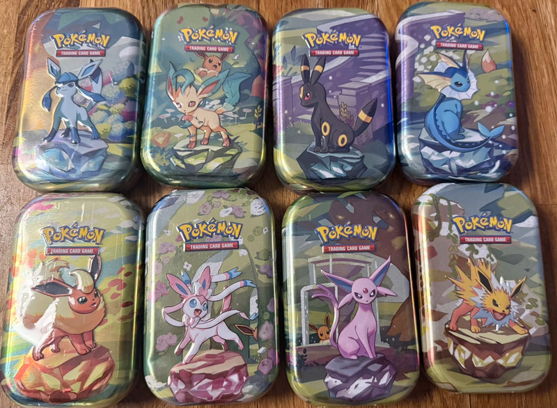 ARSET Pokemon complet des 8 Mini Tins Évolutions Prismatiques – Scellées 🔥