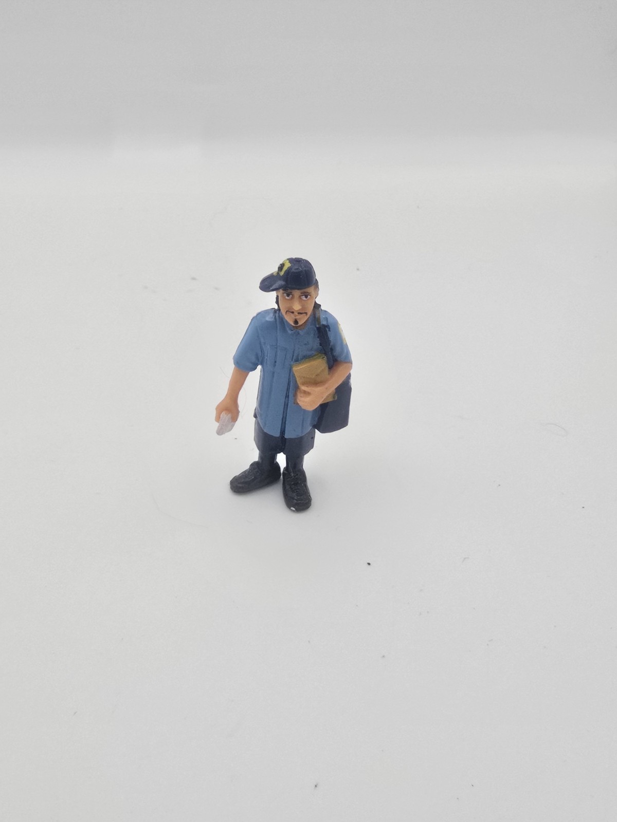 Figurina Homies serie 6 "Chuy" postino operaio postale scala 1:32