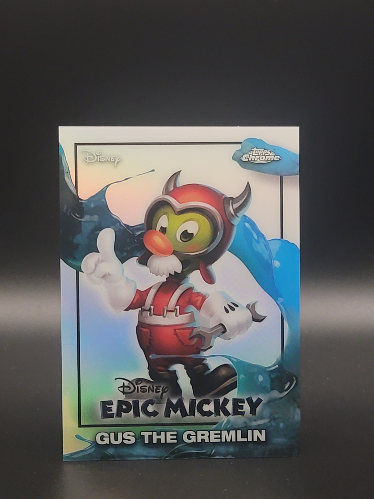 2026 Topps Disney Neon Chrome Epic Topolino Gus il Gremlin EM-14