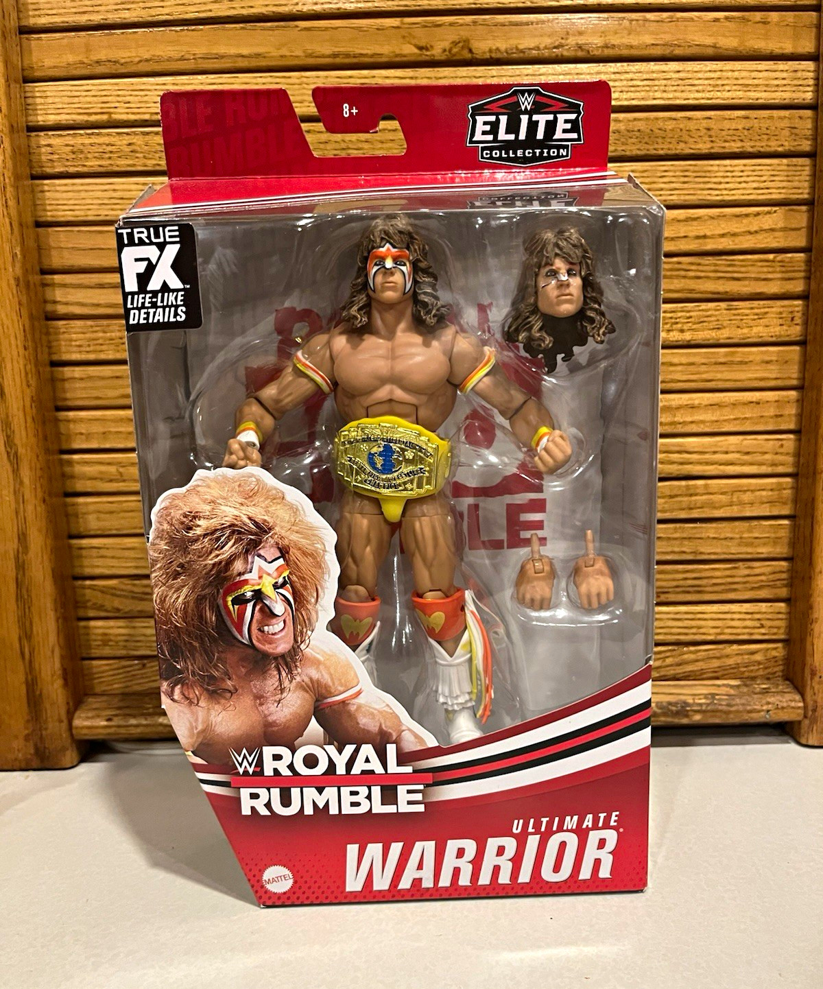 WWE Elite Collection Royal Rumble Ultimate Warrior Figura con Cintura Alt Head Mani
