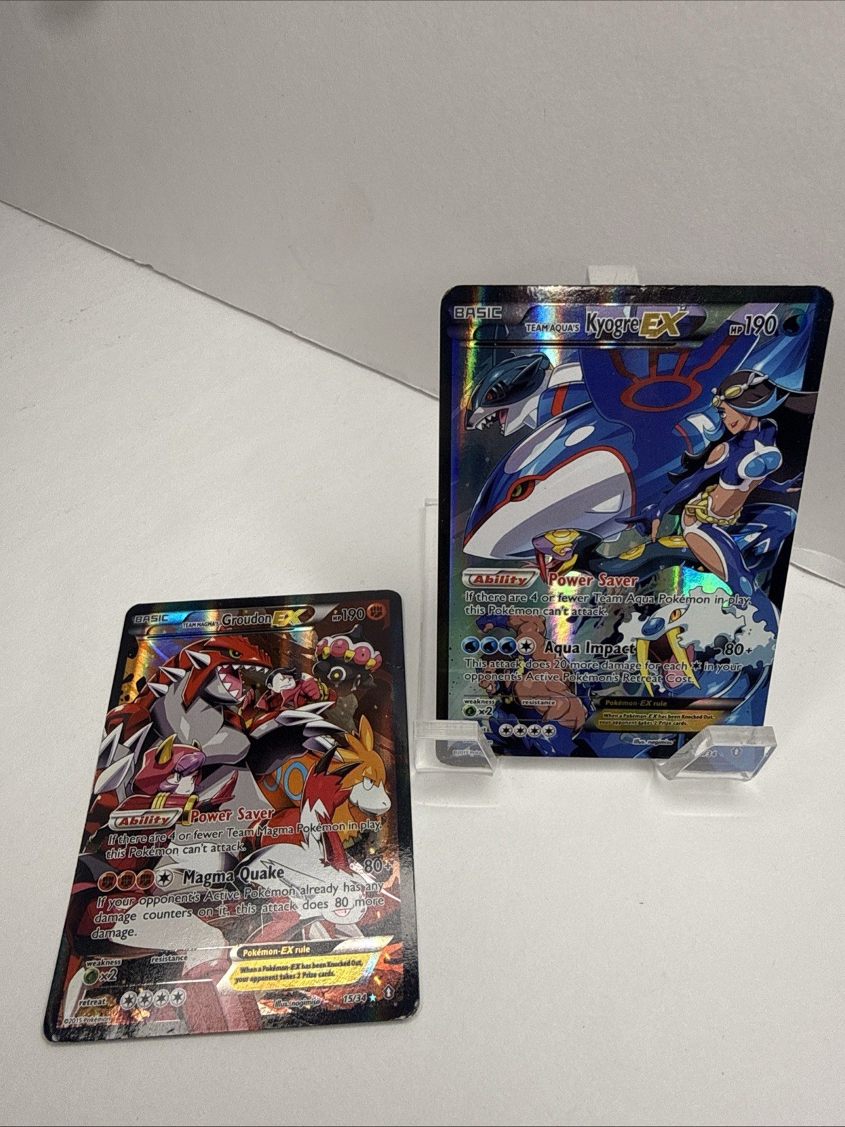 Pokemon TCG Team Magma's Groudon EX and Team Aqua's Kyogre EX Full art