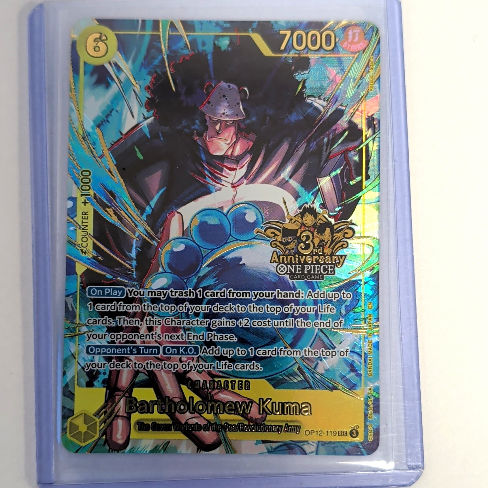 Bandai One Piece CCG Bartholomew Kuma OP12-119 EN 3rd anniversary stamp 