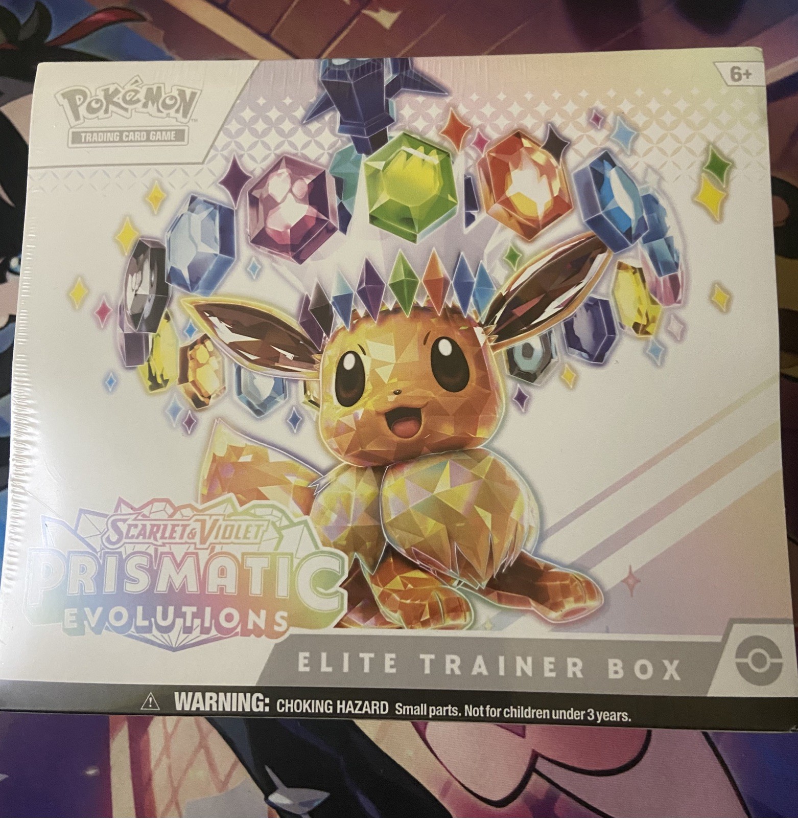 Evoluzioni Prismatiche - Elite Trainer Box (ETB) - Pokemon TCG - Nuovo e Sigillato 