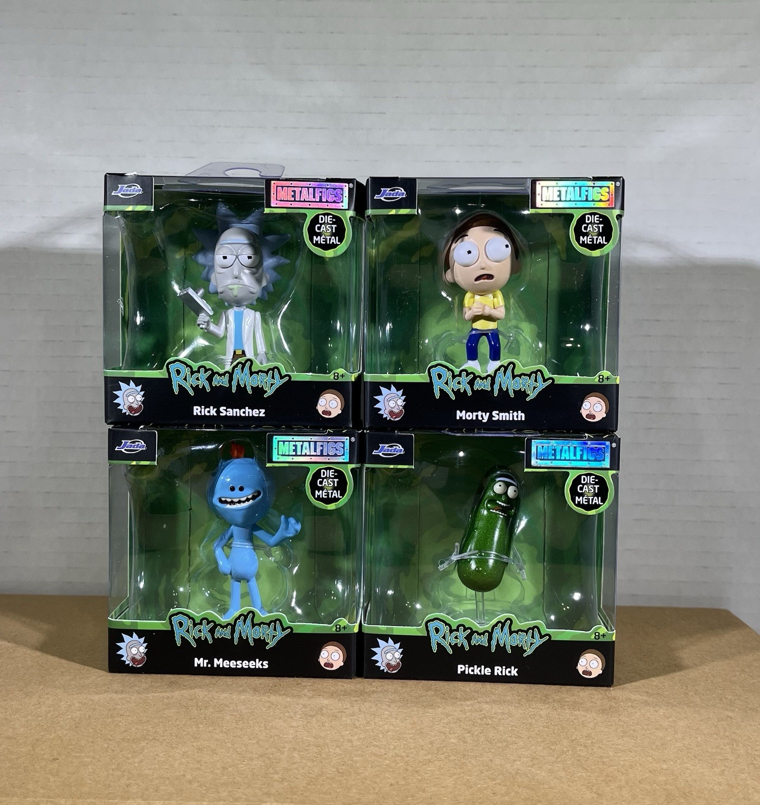 JADA RICK e MORTY FICHI IN METALLO PRESSOFUSO DA COLLEZIONE SET COMPLETO DI 4