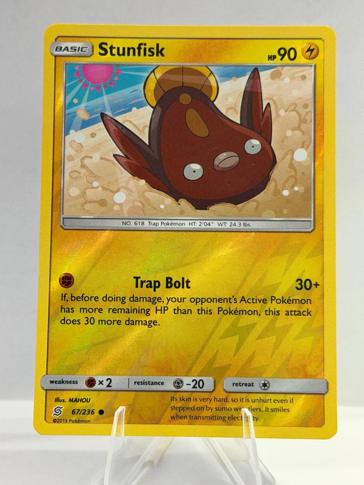 Stunfisk 67/236 Menti Unificate Comuni Pokemon Reverse Holo leggermente giocato