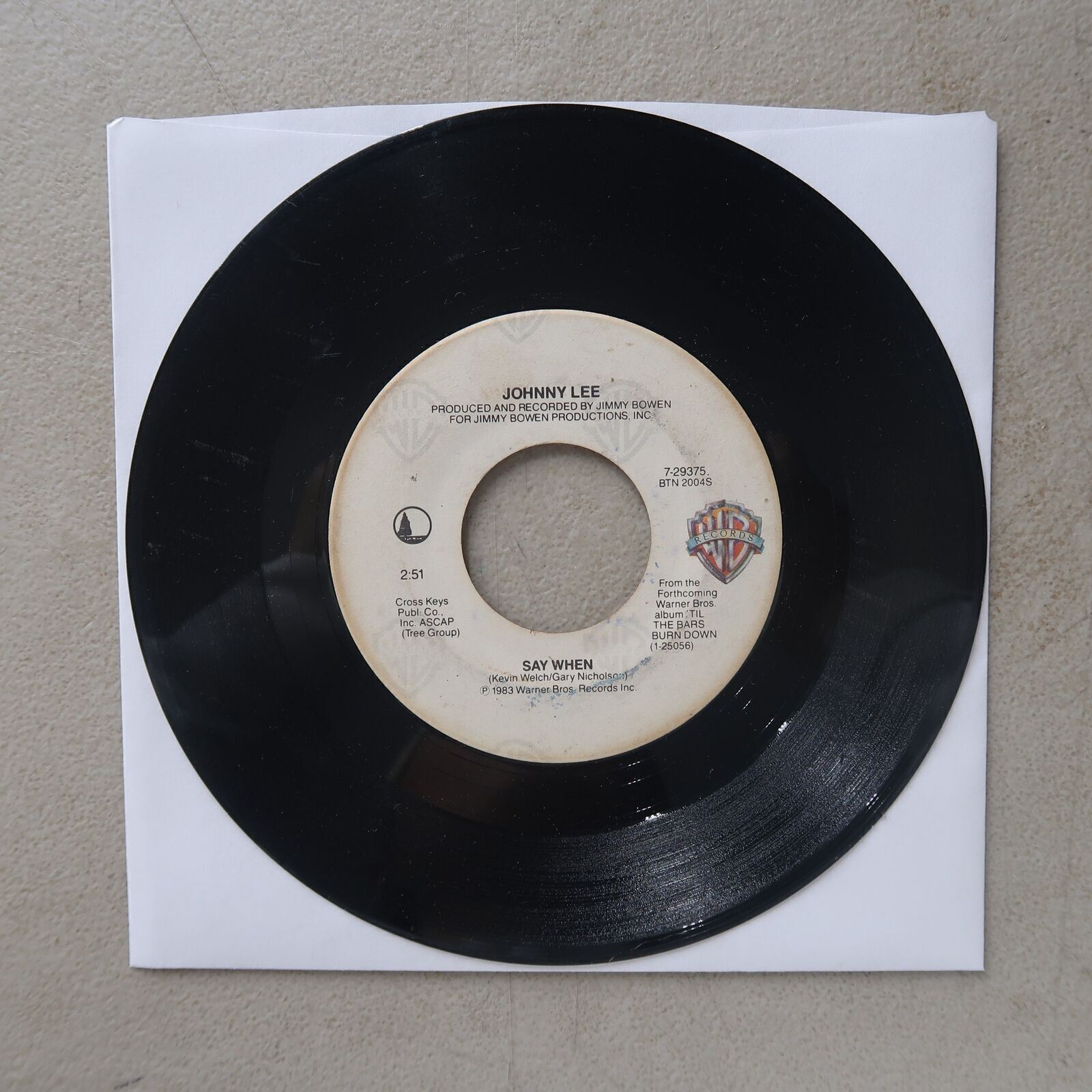 JOHNNY LEE SAY WHEN/THE YELLOW ROSE WARNER BROS RECORDS VINYL 45 VG 21-93