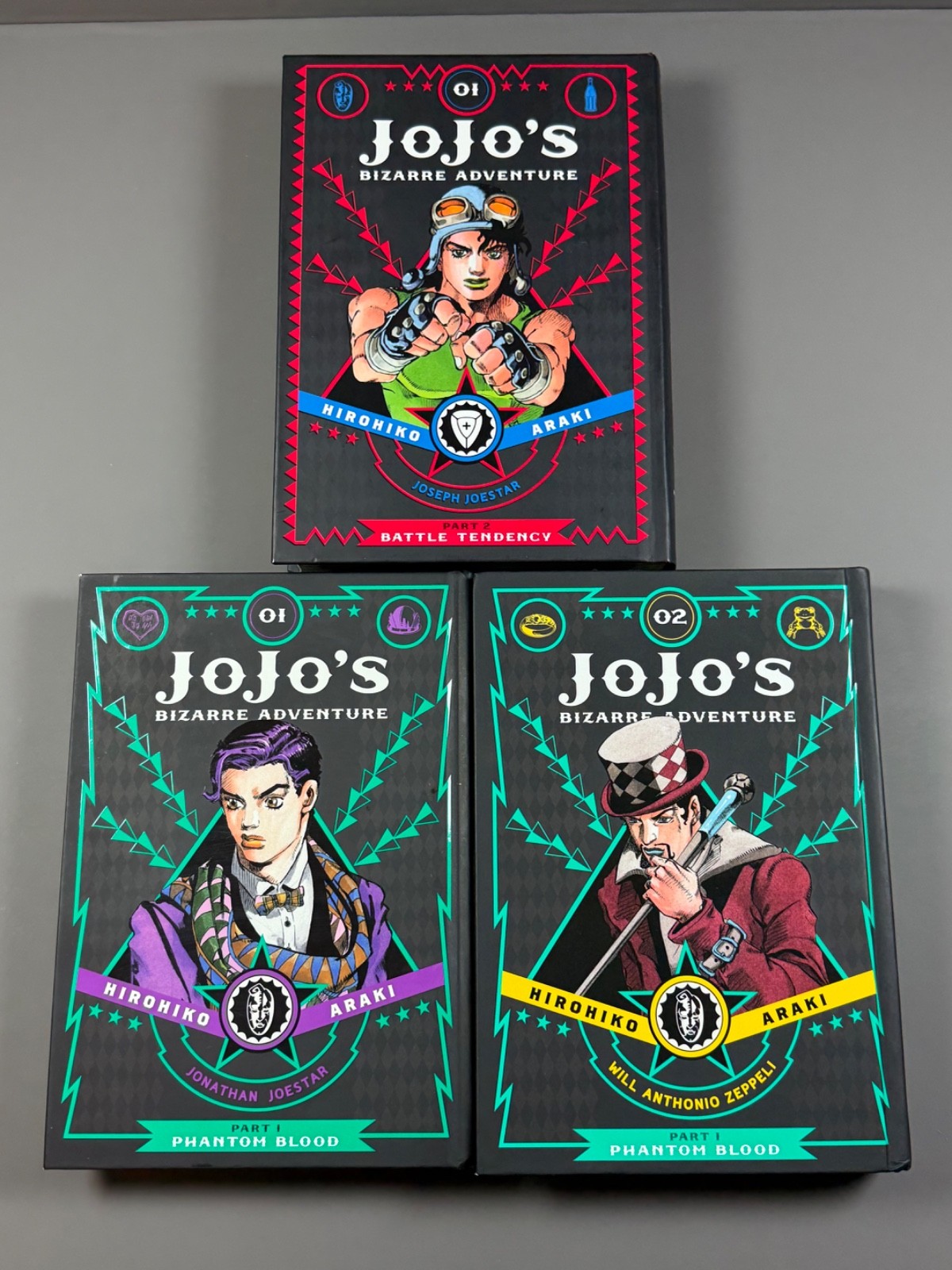 JoJo’s Bizarre Adventure, Part 1 Vol. 1 & 2  + Part 2 Vol. 1 + Bookmark