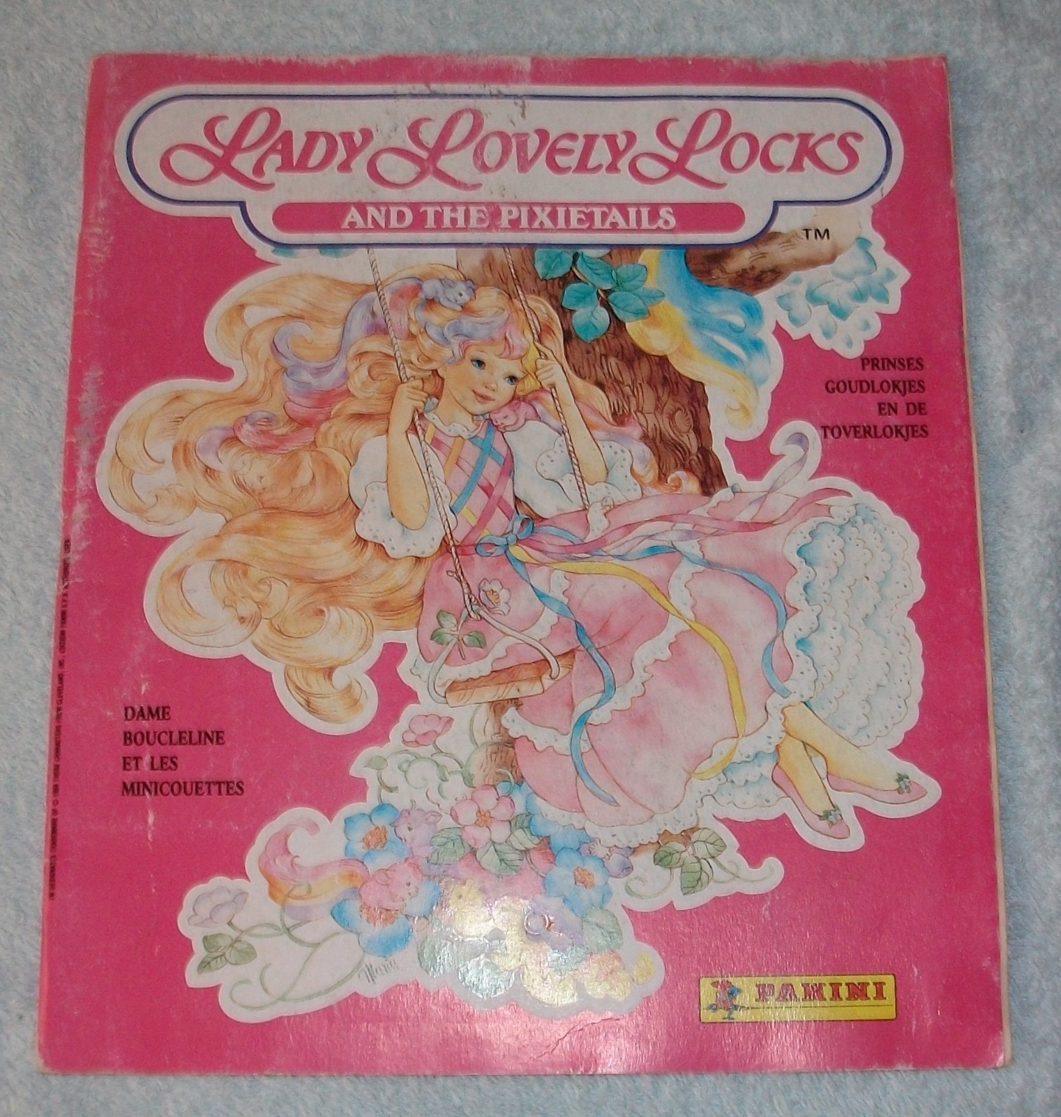 LADY LOVELY LOCKS AND THE PIXIETAILS, album VIDE de 1988 de PANINI,très bon état