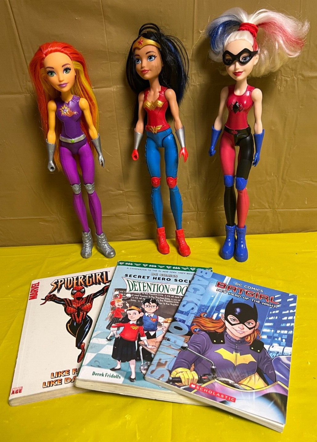 Super Hero Action dolls (3)  & 3 hero books-Super girl, Batgirl, Hero Society