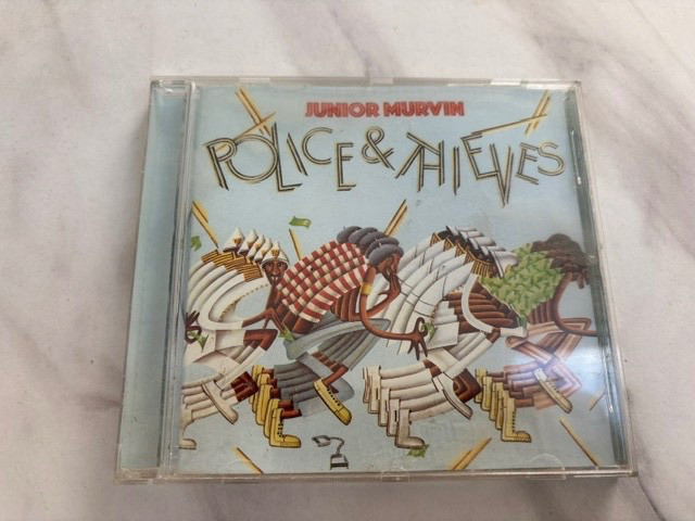 JUNIOR MURVIN-POLICE AND THIEVES. 10 TRACK REMASTERED CD. ISLAND 1977.