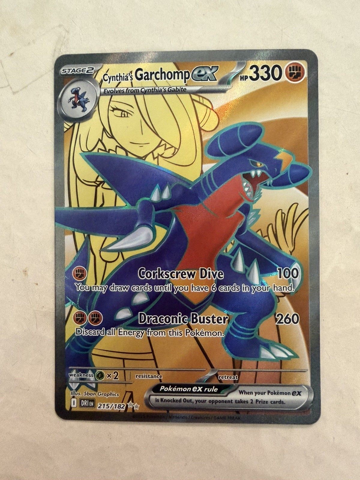 The Pokémon Company Garchomp di Cynthia ex 215/182 SV10 FA Holo UR Eng 330HP