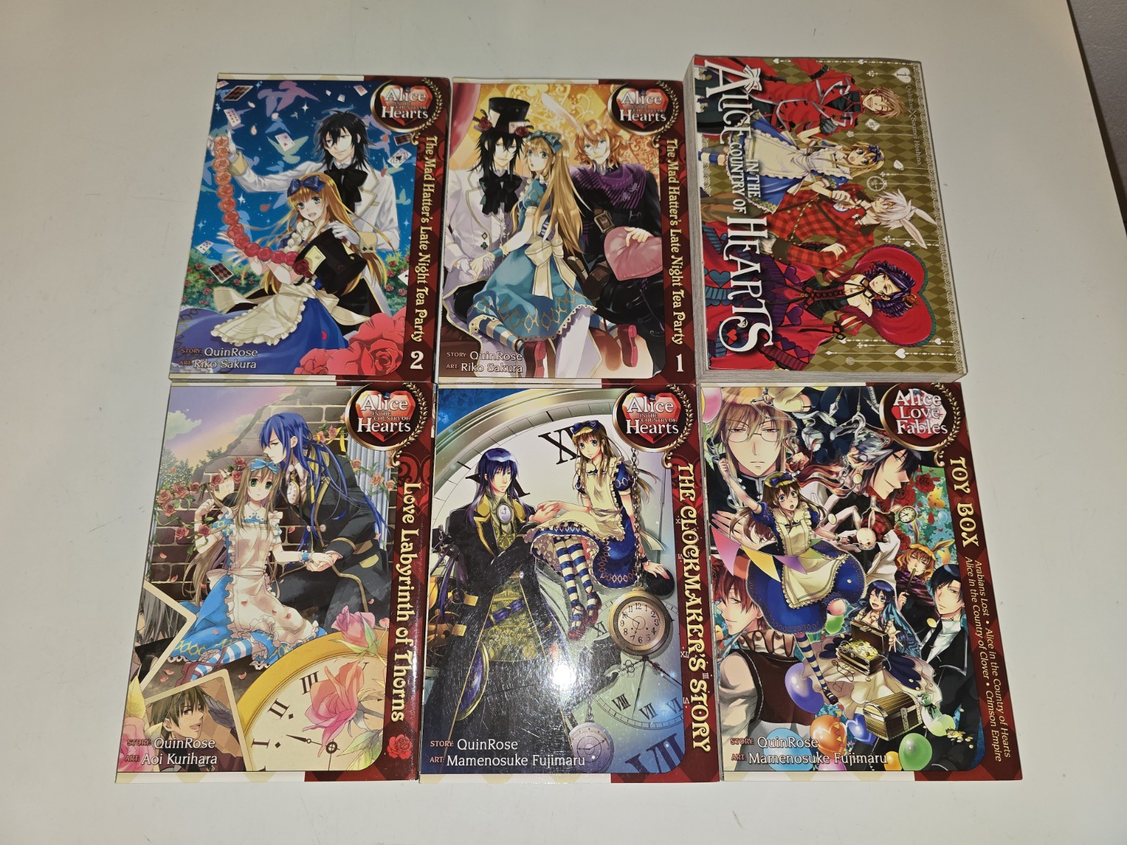 Set 6 libri Alice nel paese dei cuori Cappellai Matti Lare Night Tea Party