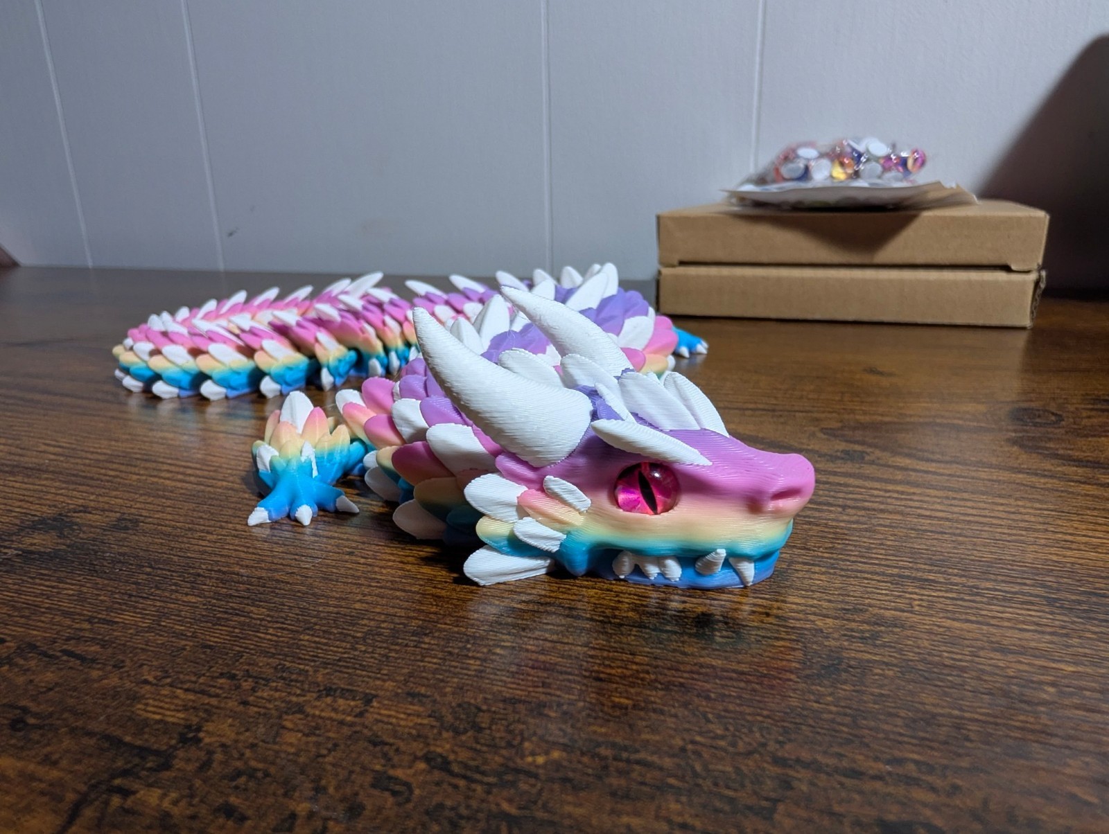 3D Printed Zephyros Articulated Dragon - Lollipop Rainbow with Red Glass Eyes - 