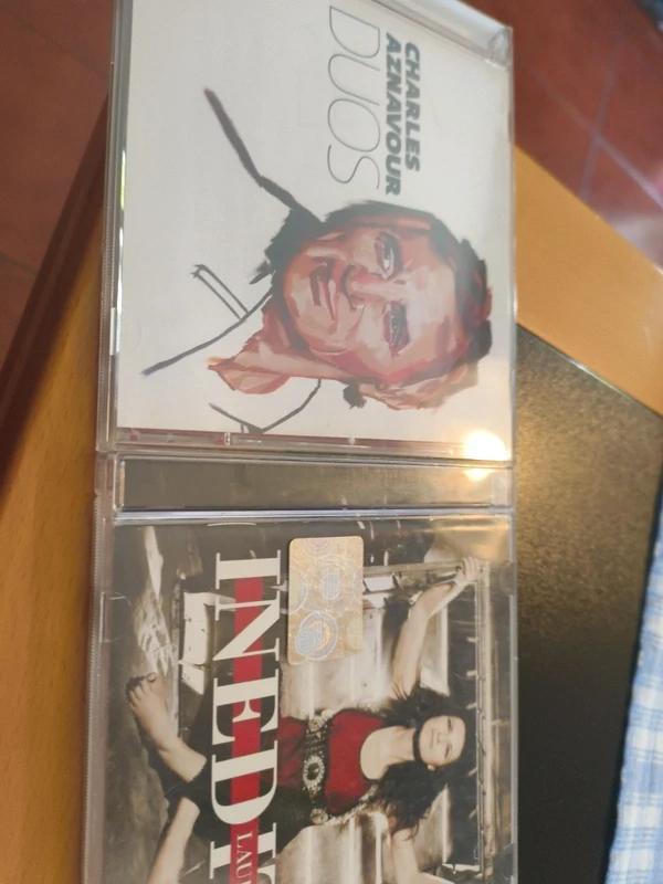 CD Pausini e CD Aznavour