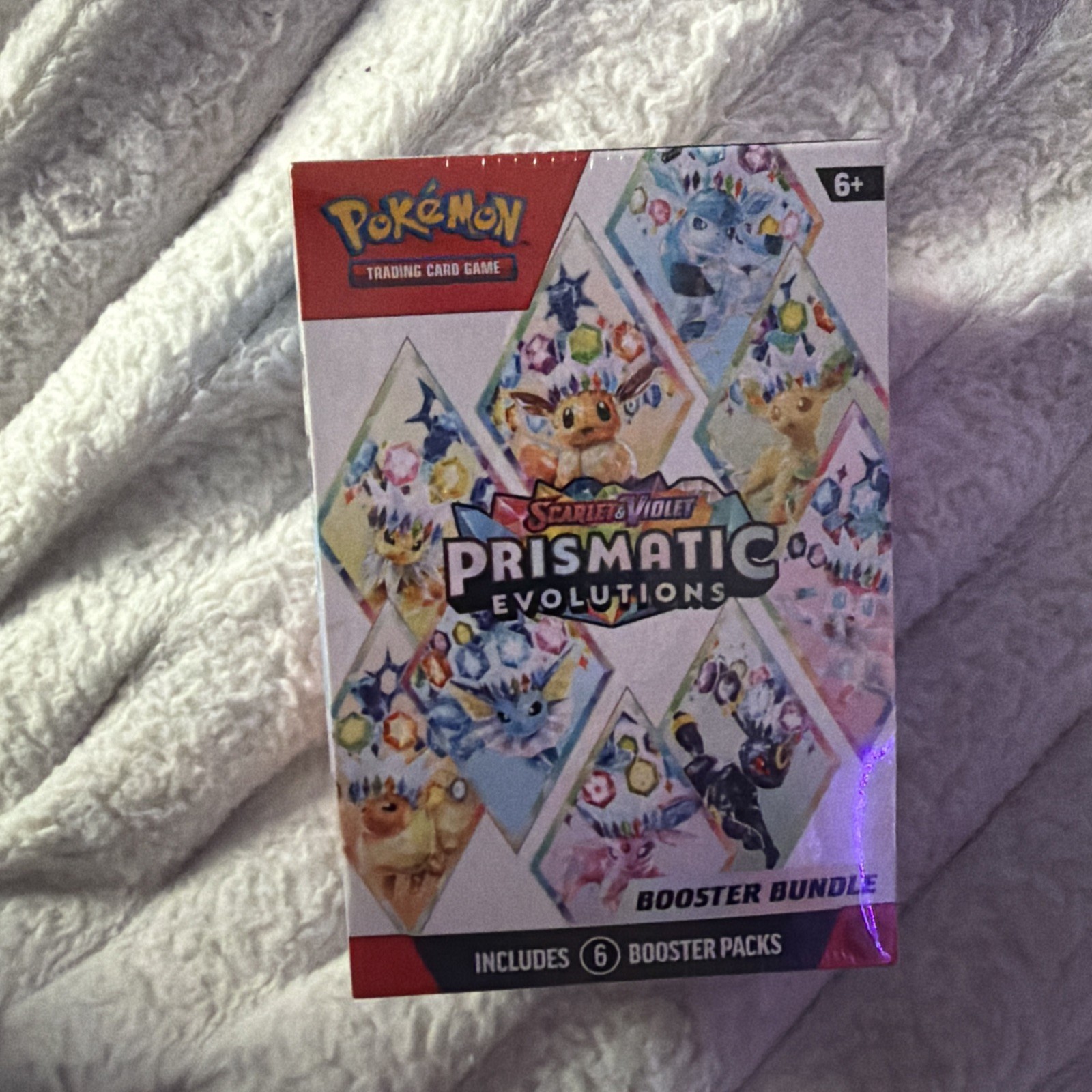 Pacchetto Booster Evoluzioni Prismatiche