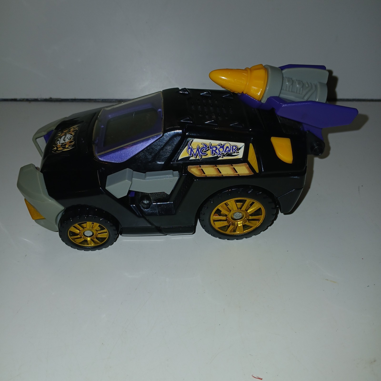 VTech Switch-N-Go Dinos MC Roar Talking Giganotosaurus nero e viola 